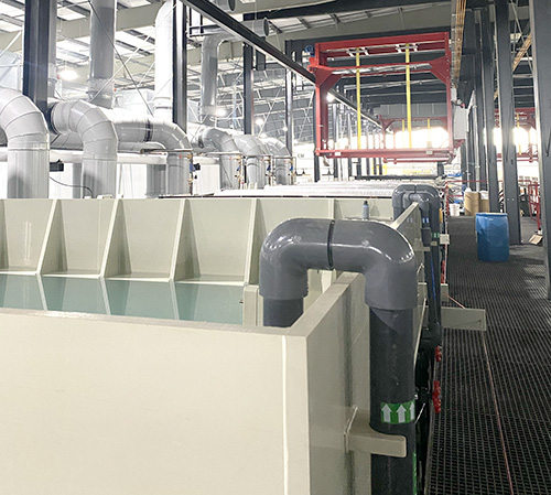 Automated cleaning and passivation system with six hoists designed by Palm Technology for high-throughput surface finishing